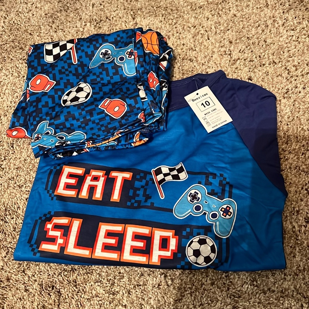 New size 10 pajamas.  Beezizac gamer pajamas. Long sleeves and pants.
